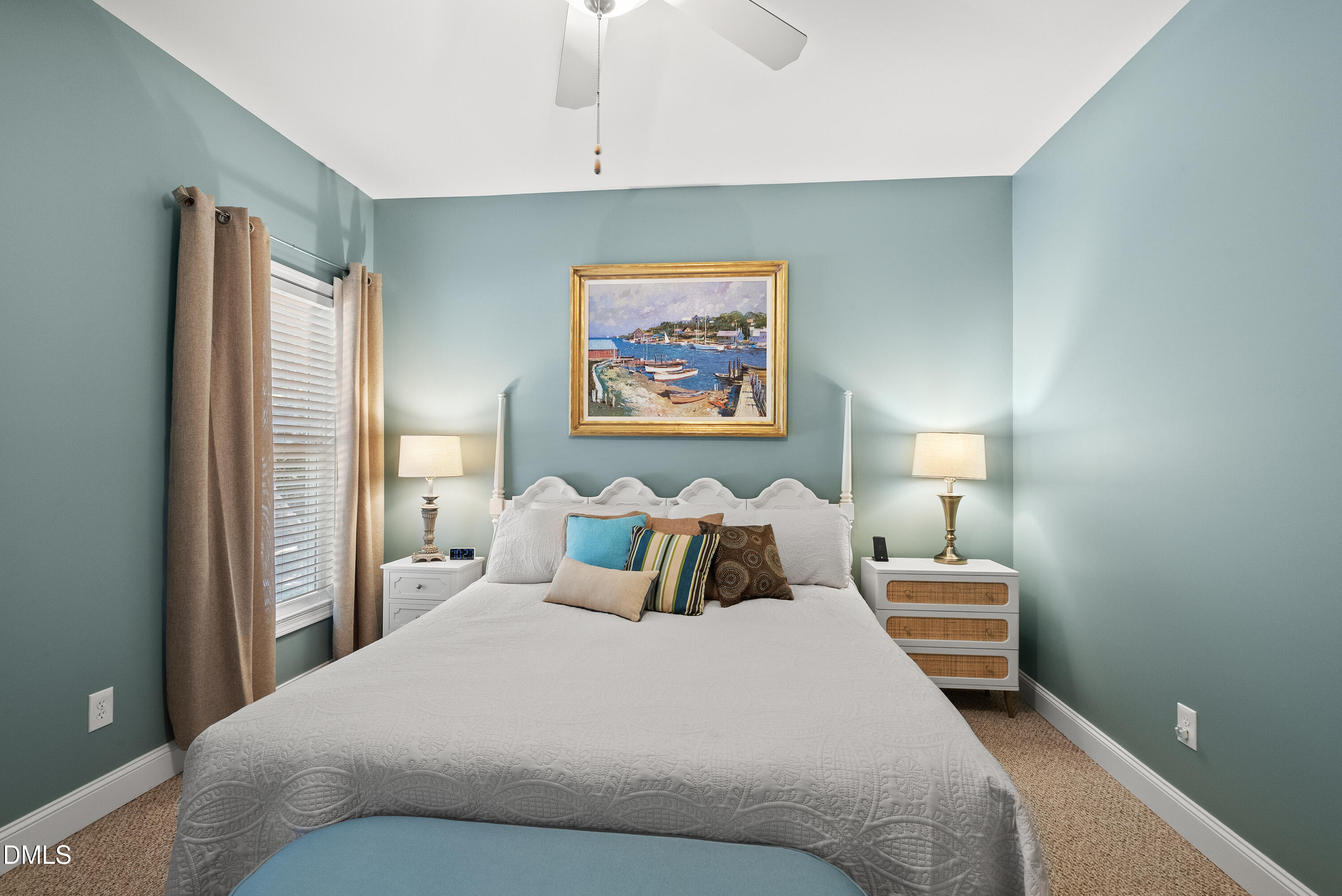214 Crystal Bay Lane Semora, NC 27343 - Photo 20 of 37 a bedroom with a bed and a lamp