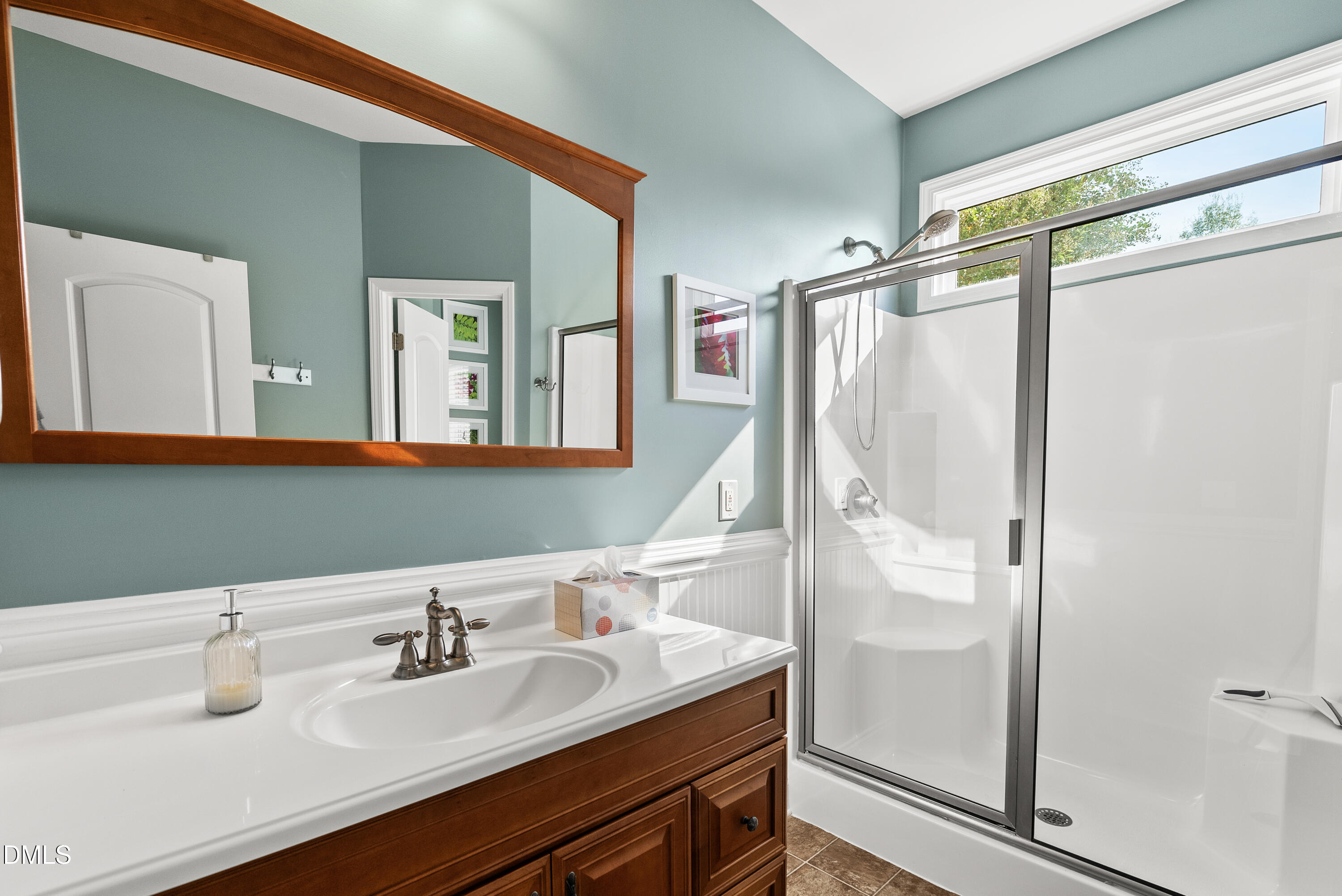 214 Crystal Bay Lane Semora, NC 27343 - Photo 21 of 37 a bathroom with a sink vanity mirror and shower