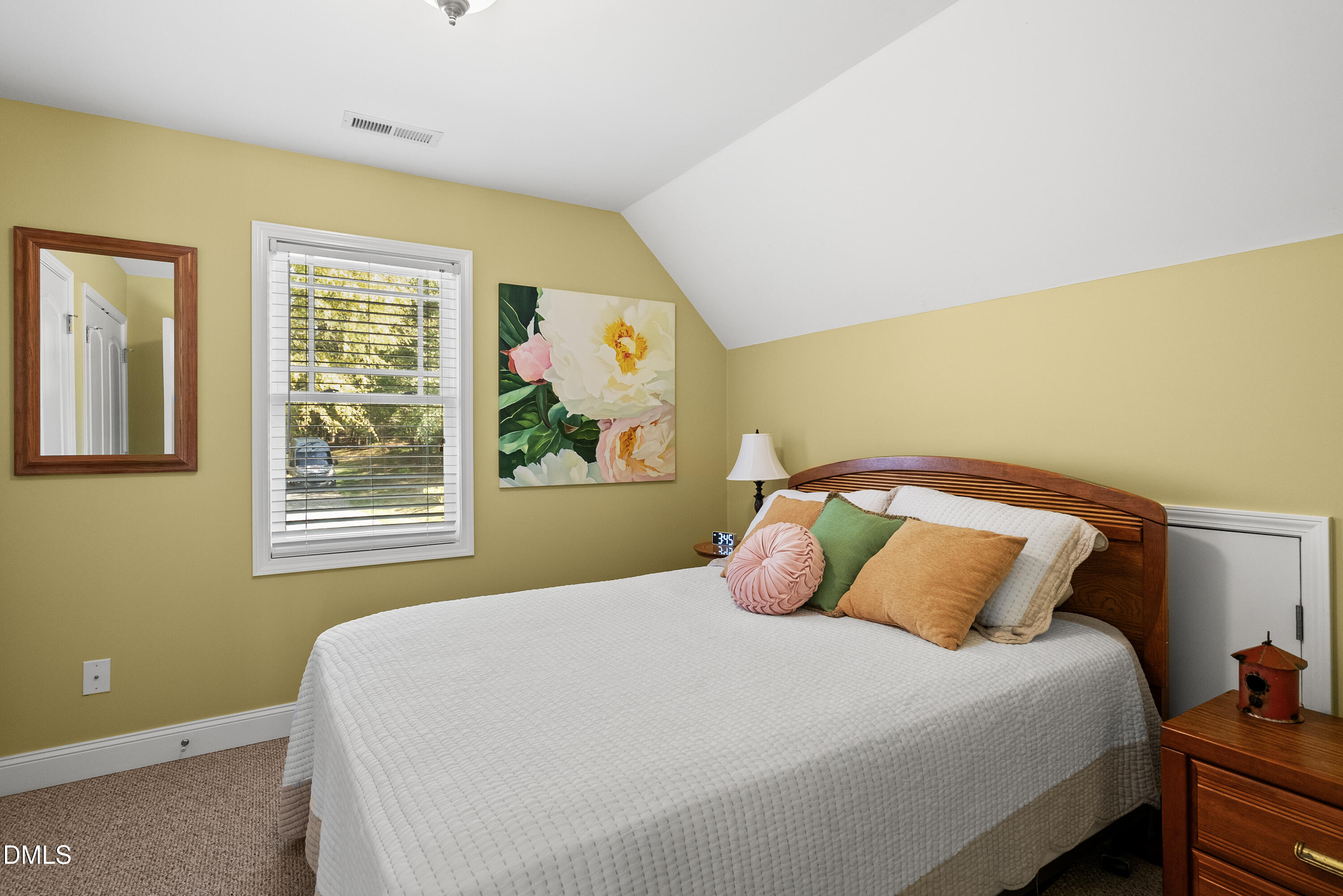 214 Crystal Bay Lane Semora, NC 27343 - Photo 25 of 37 a bedroom with a bed and wooden floor