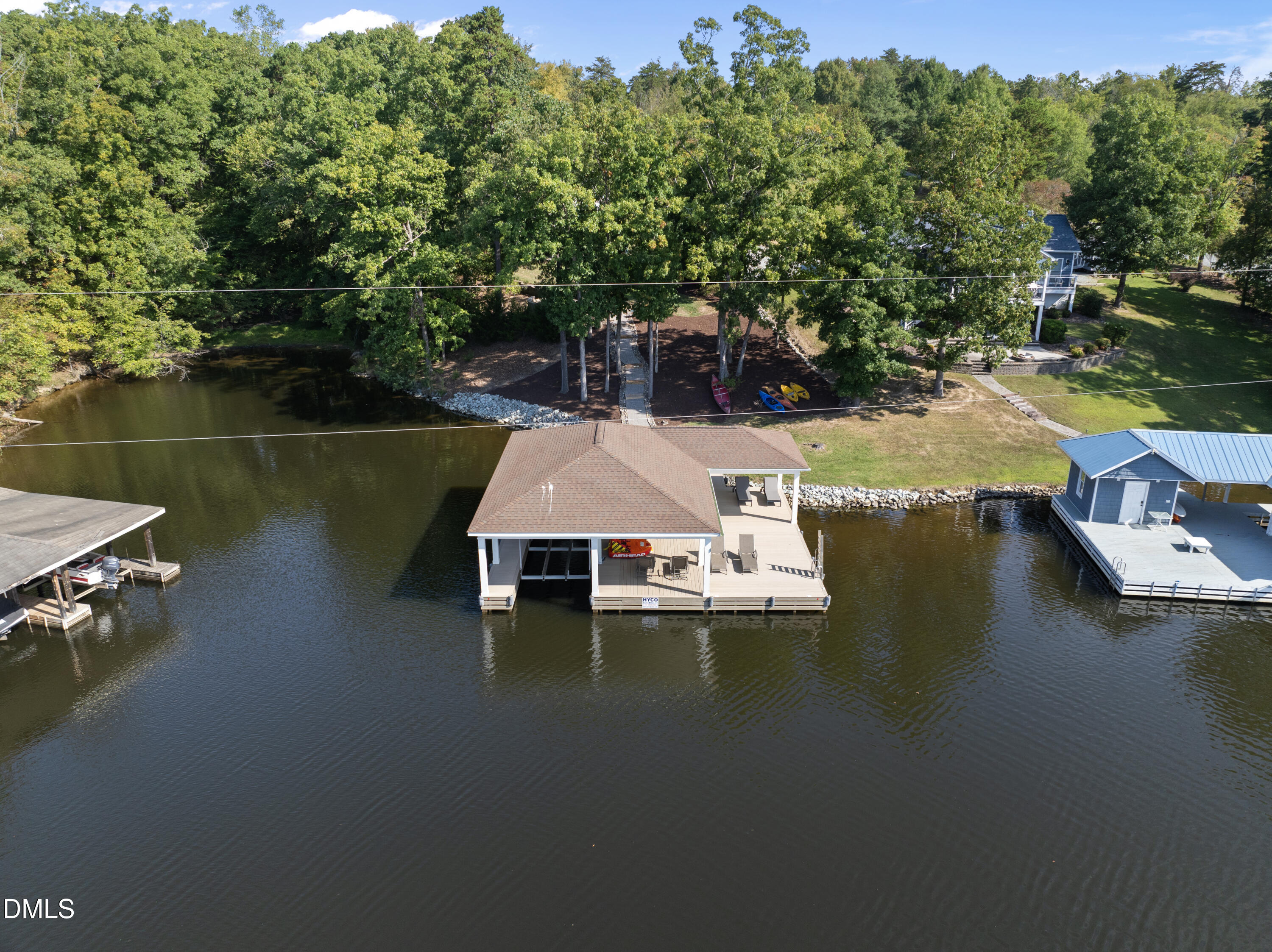 214 Crystal Bay Lane Semora, NC 27343 - Photo 27 of 37 an aerial view of a house with swimming pool outdoor seating and yard