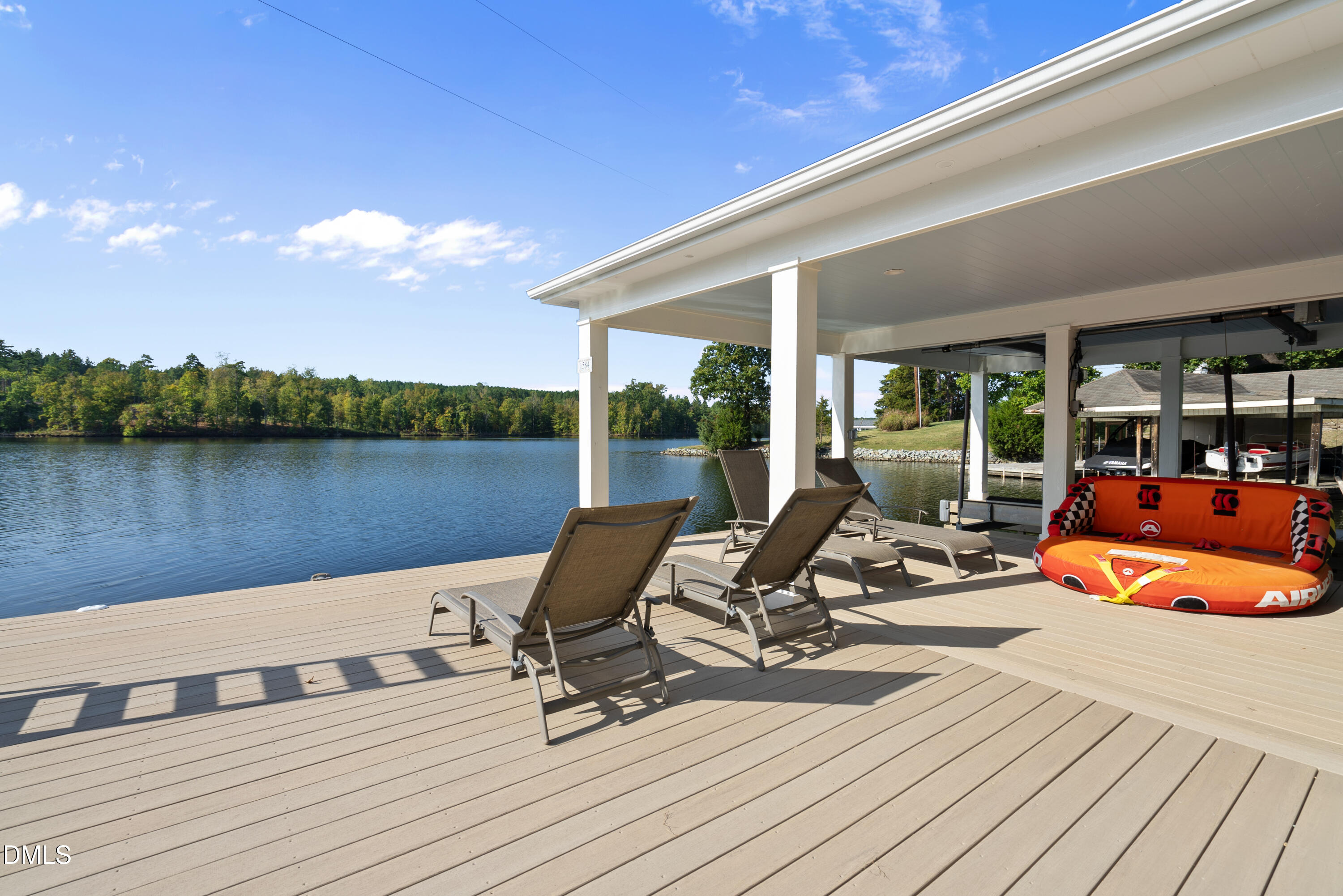 214 Crystal Bay Lane Semora, NC 27343 - Photo 28 of 37 a view of a swimming pool with lounge chairs in patio