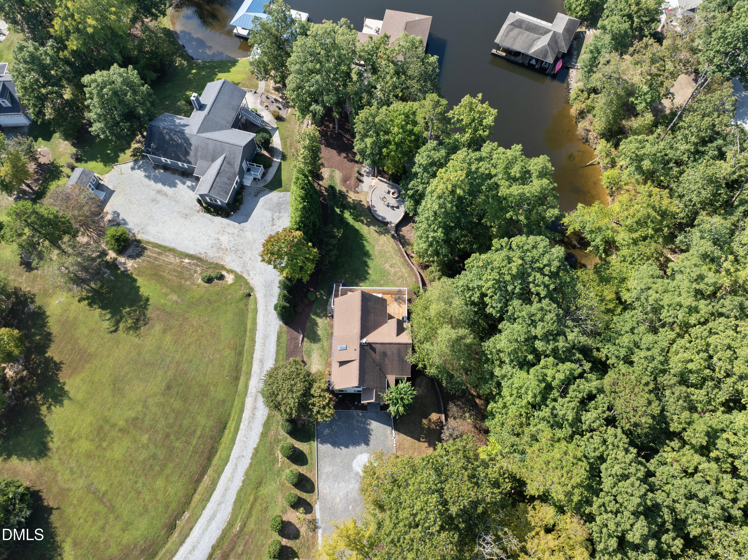 214 Crystal Bay Lane Semora, NC 27343 - Photo 29 of 37 an aerial view of residential house with outdoor space and trees all around