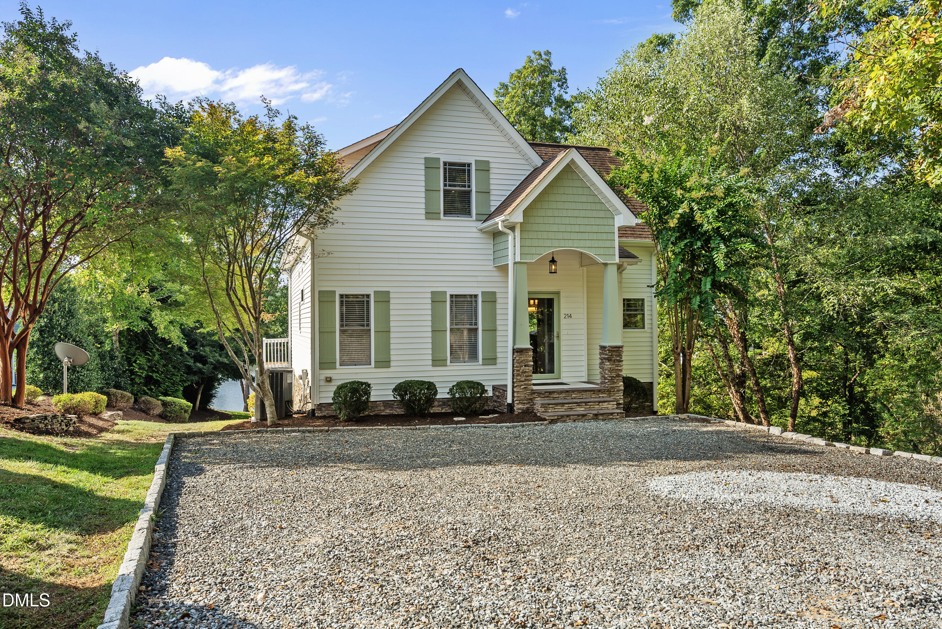 214 Crystal Bay Lane Semora, NC 27343 - Photo 30 of 37 a front view of a house with a yard