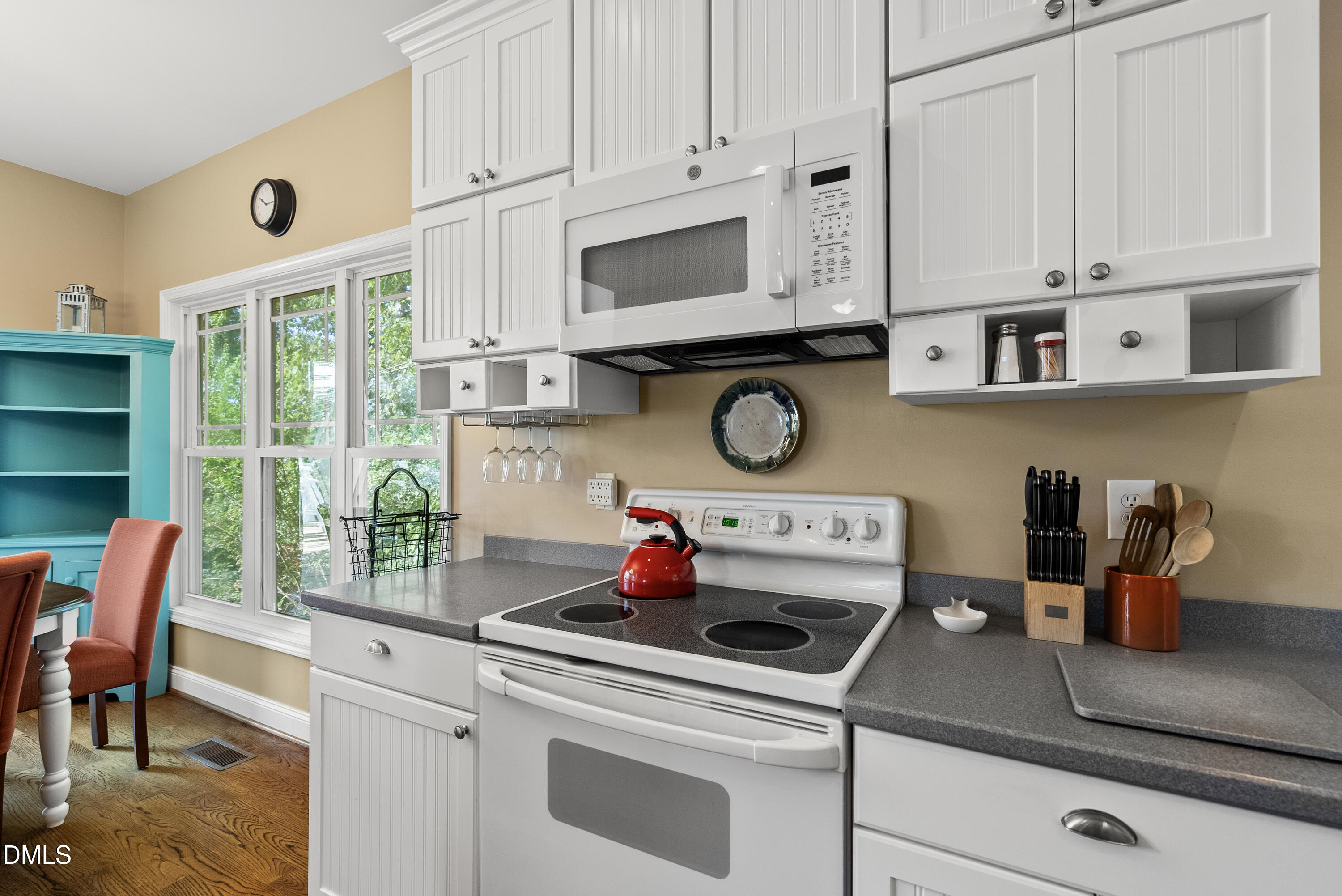 214 Crystal Bay Lane Semora, NC 27343 - Photo 32 of 37 a kitchen with a stove and a microwave