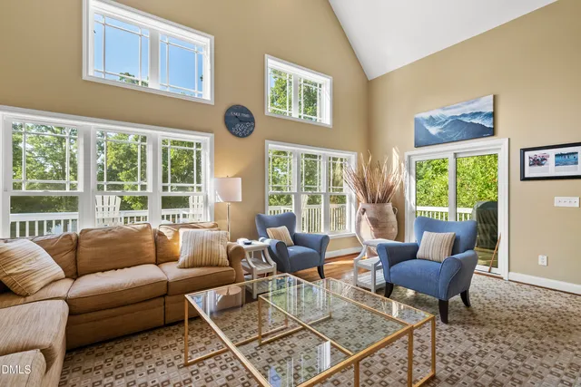 a view of a deck with a large window