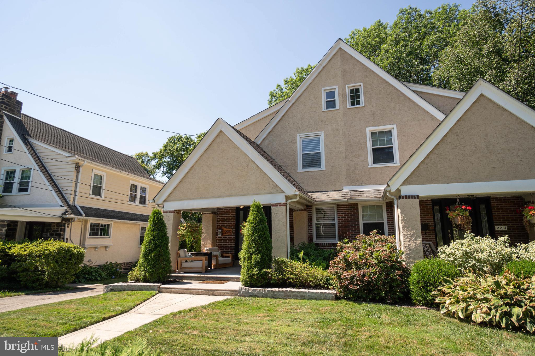 2912 Mapleshade Road Ardmore, PA 19003 - Photo 2 of 46 a front view of a house with a yard