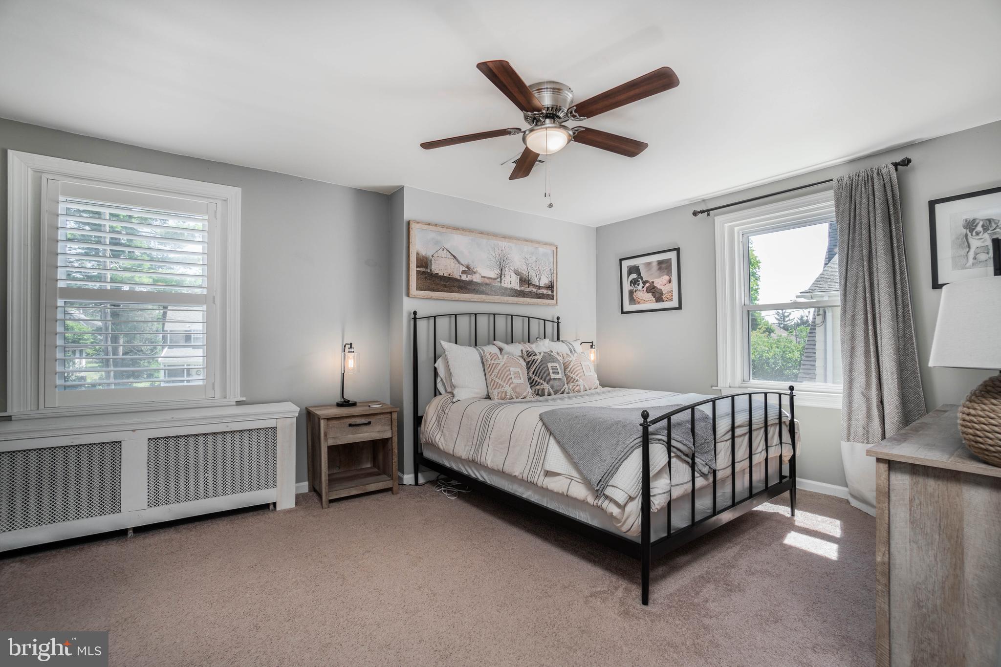 2912 Mapleshade Road Ardmore, PA 19003 - Photo 24 of 46 a bed sitting in a bedroom next to a window