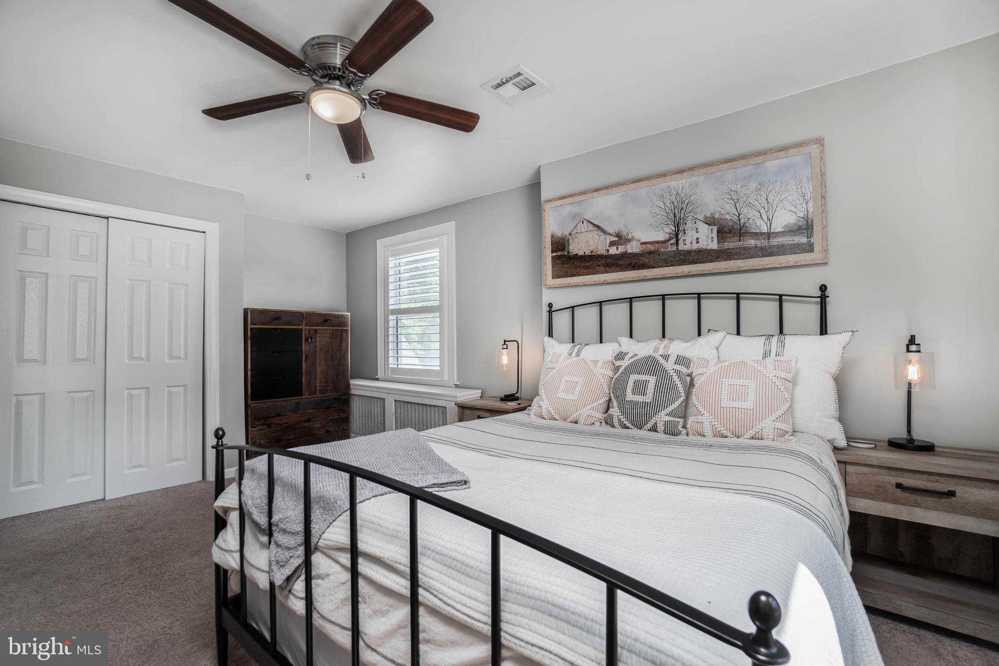 2912 Mapleshade Road Ardmore, PA 19003 - Photo 25 of 46 a bedroom with a bed and a flat screen tv