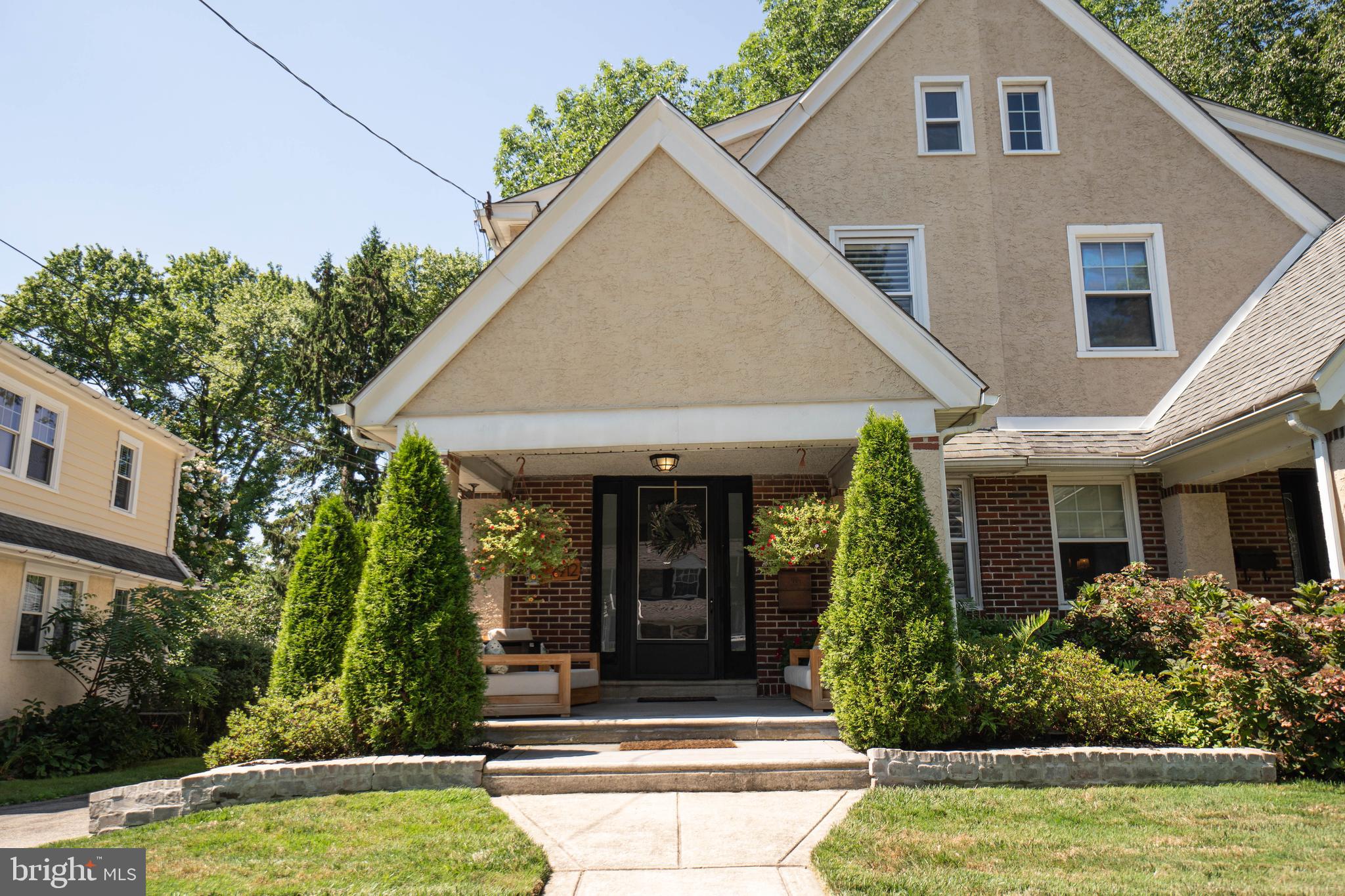2912 Mapleshade Road Ardmore, PA 19003 - Photo 3 of 46 a front view of a house with garden