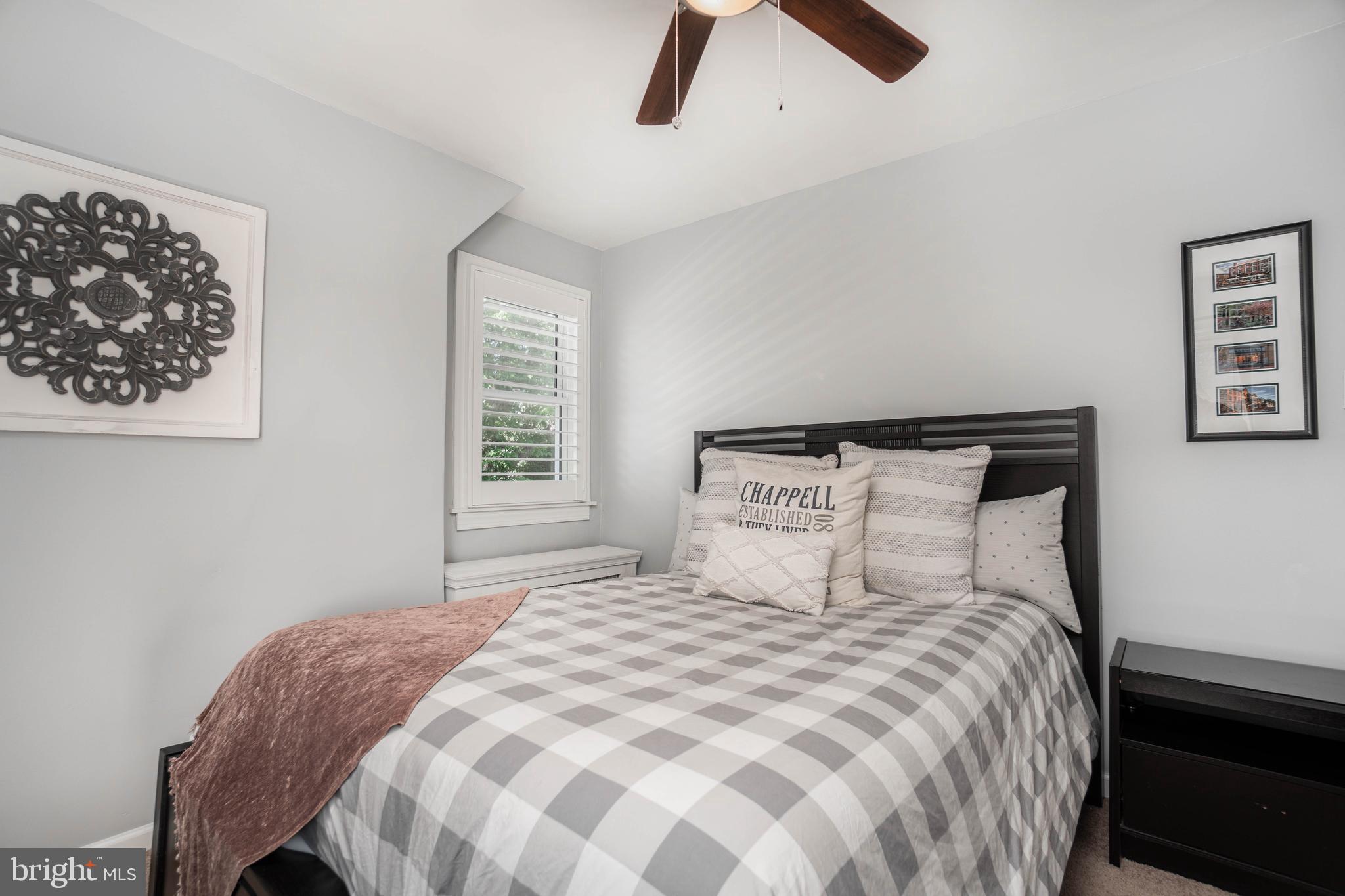 2912 Mapleshade Road Ardmore, PA 19003 - Photo 31 of 46 a bedroom with a bed and window