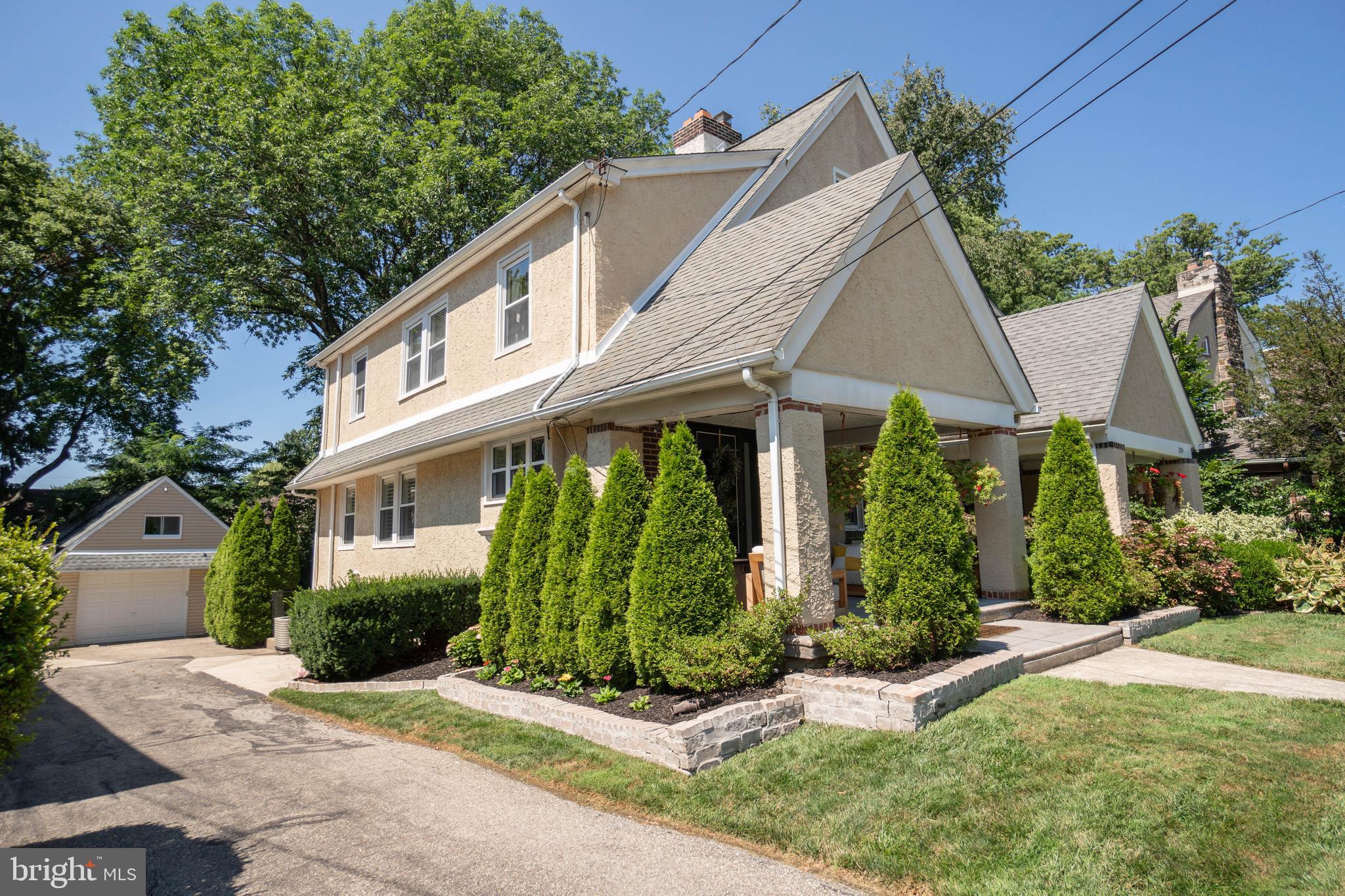 2912 Mapleshade Road Ardmore, PA 19003 - Photo 5 of 46 a view of a white house next to a yard