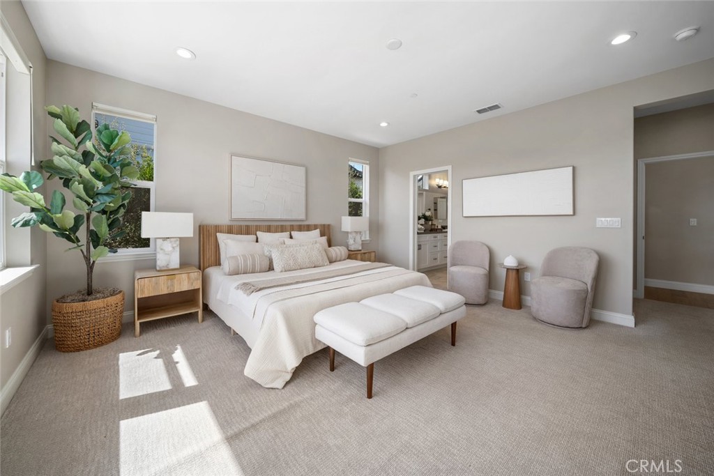 1455 Via Vista Nipomo, CA 93444 - Photo 25 of 34 a bedroom with a bed and a couch