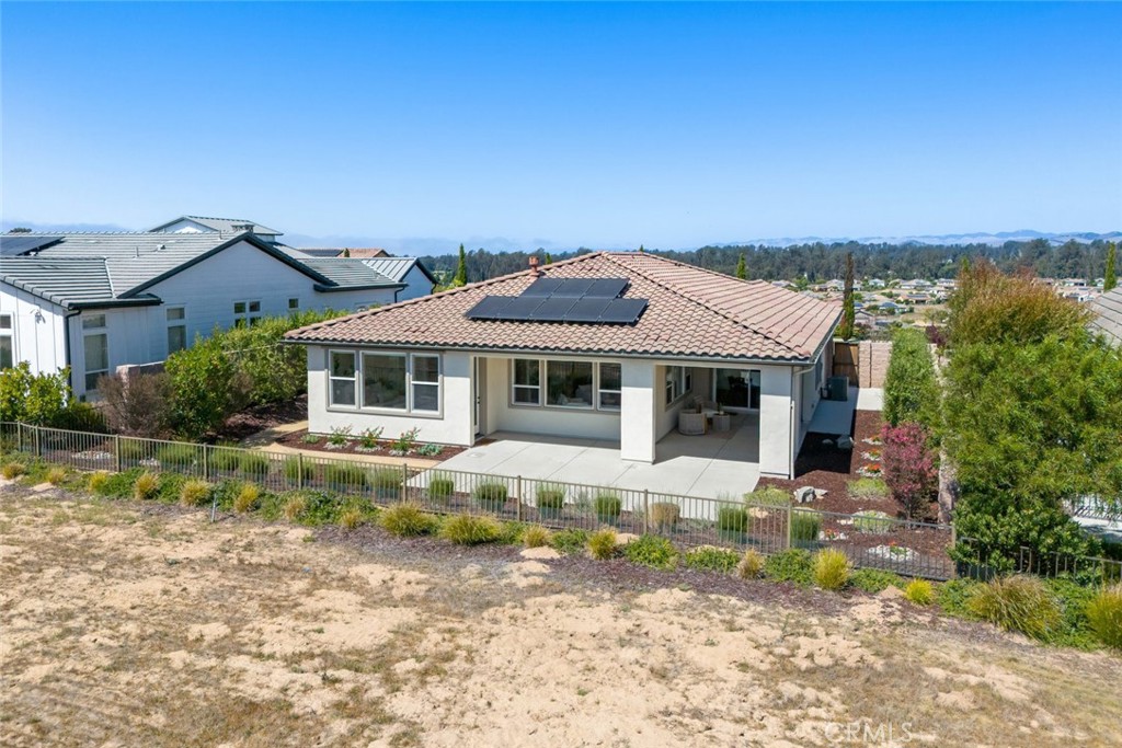 1455 Via Vista Nipomo, CA 93444 - Photo 33 of 34 a front view of a house with a yard fountain
