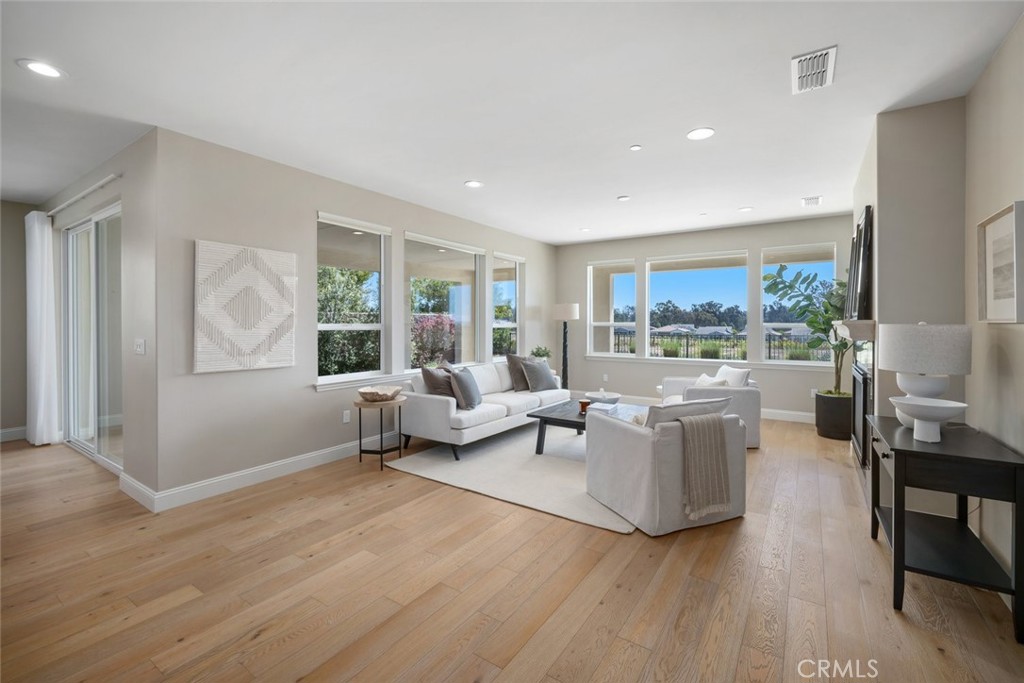1455 Via Vista Nipomo, CA 93444 - Photo 5 of 34 a living room with furniture and a large window