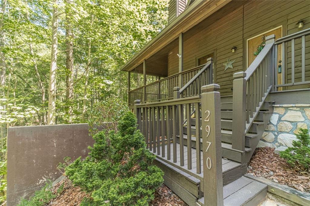 2970 Sky Lake Road Sautee Nacoochee, GA 30571 - Photo 3 of 53 a view of a house with wooden fence