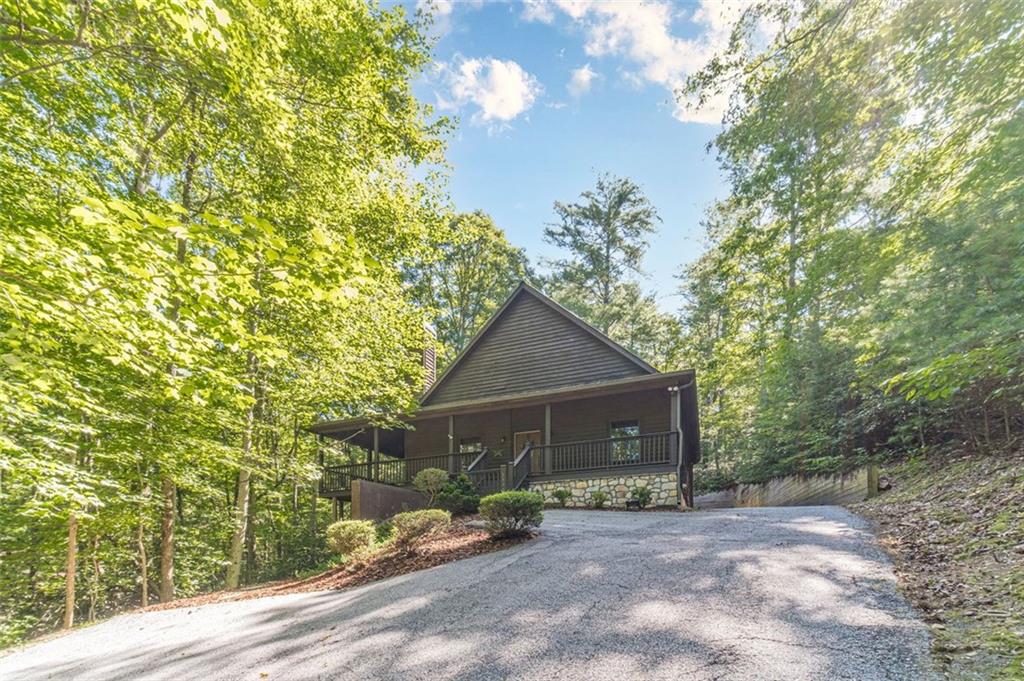 2970 Sky Lake Road Sautee Nacoochee, GA 30571 - Photo 52 of 53 a view of a house with a tree in the background