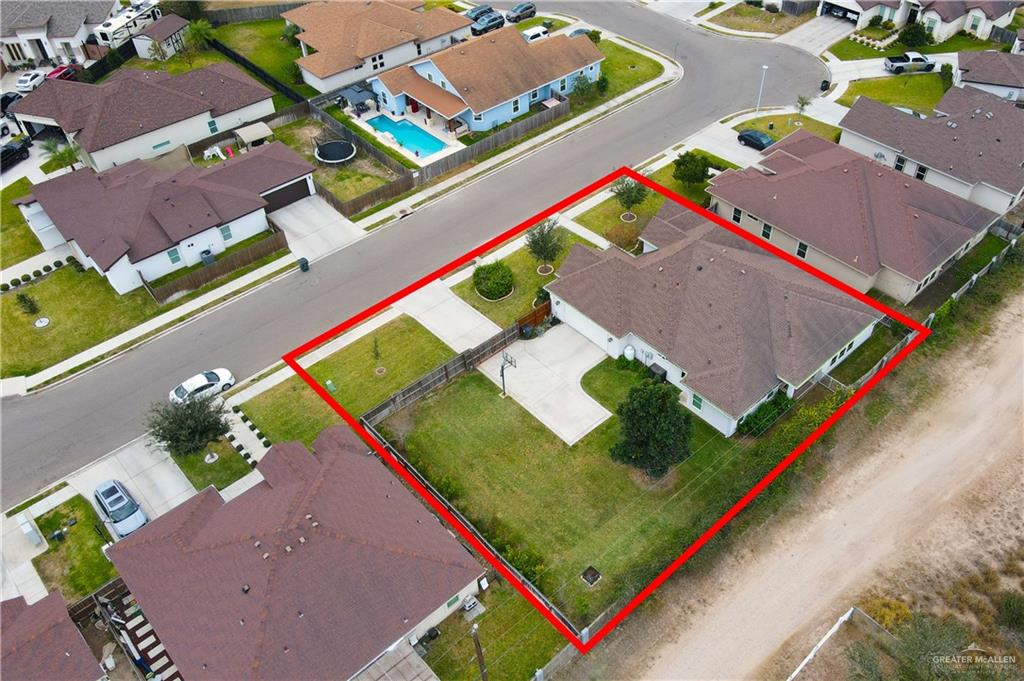 2701 Thompson Street Mission, TX 78573 - Photo 21 of 23 Aerial view of residential area with property parcel outlined