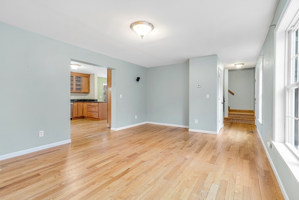 97 Packard Road Stow, MA 01775 - Photo 12 of 31 a view of empty room with wooden floor