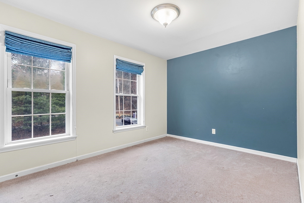 97 Packard Road Stow, MA 01775 - Photo 17 of 31 an empty room with windows