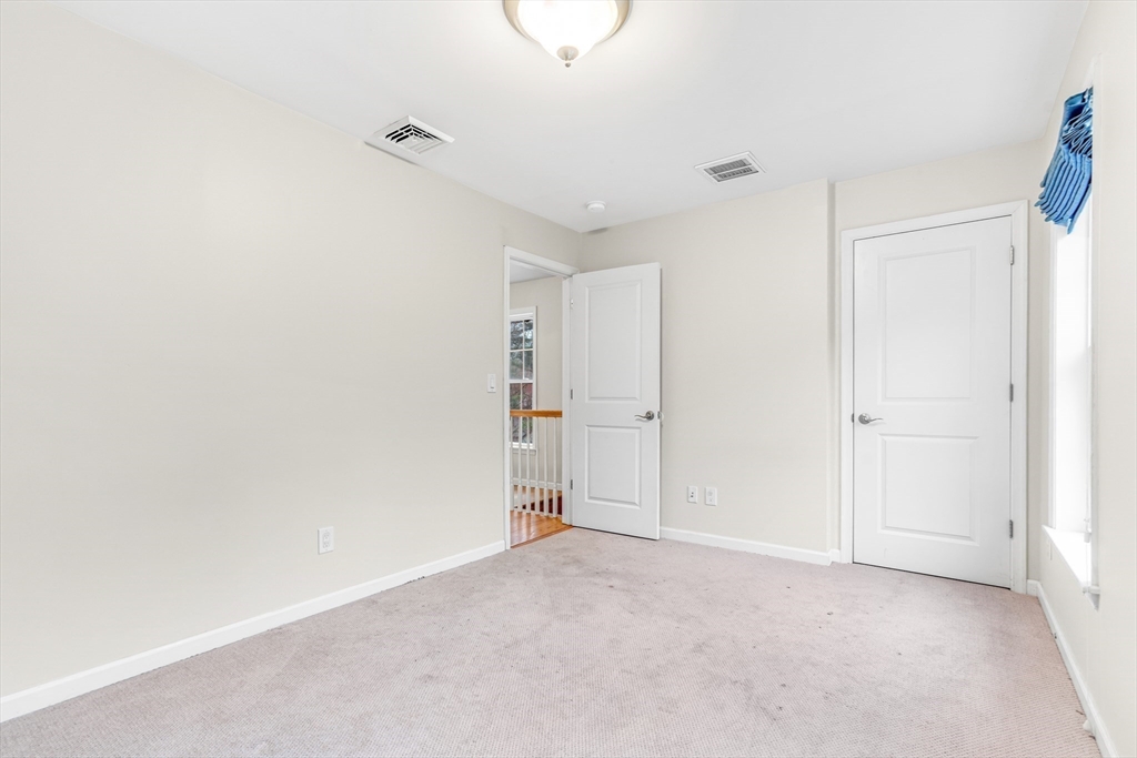 97 Packard Road Stow, MA 01775 - Photo 18 of 31 a view of an empty room