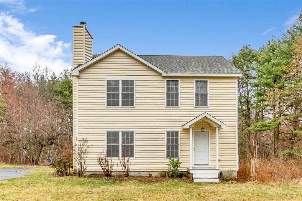 97 Packard Road Stow, MA 01775 - Photo 31 of 31 a view of a house with a yard