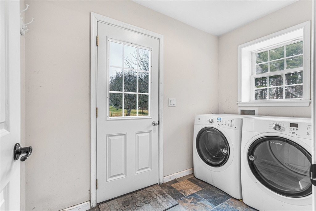 97 Packard Road Stow, MA 01775 - Photo 9 of 31 a utility room with dryer and washer