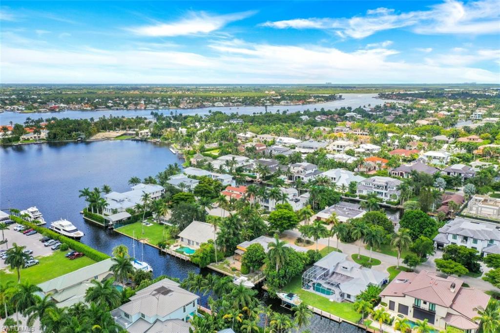 635 15th Avenue South Naples, FL 34102 - Photo 4 of 13 an aerial view of a city