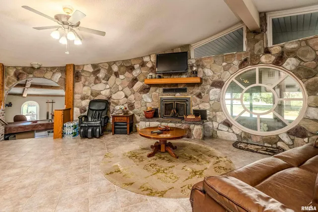 a bathroom with a sink a mirror and shower