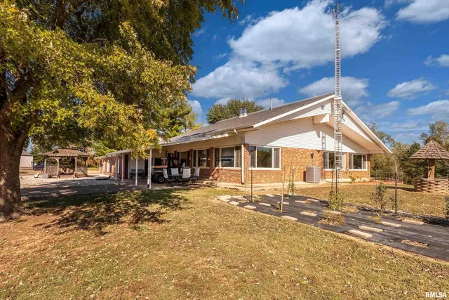 a front view of house with yard