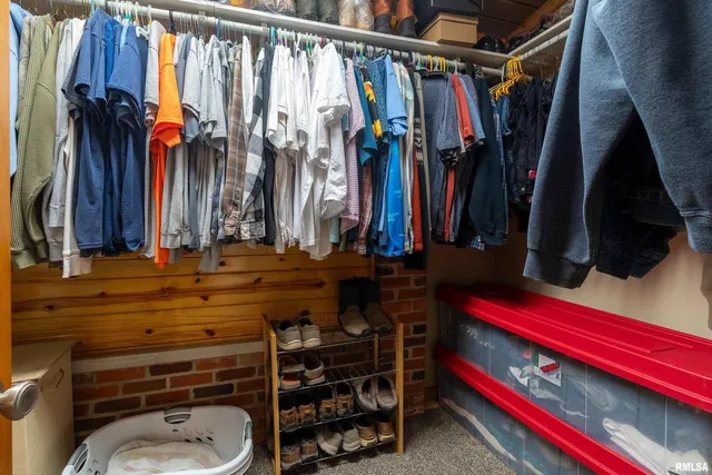 a view of a patio with table and chairs