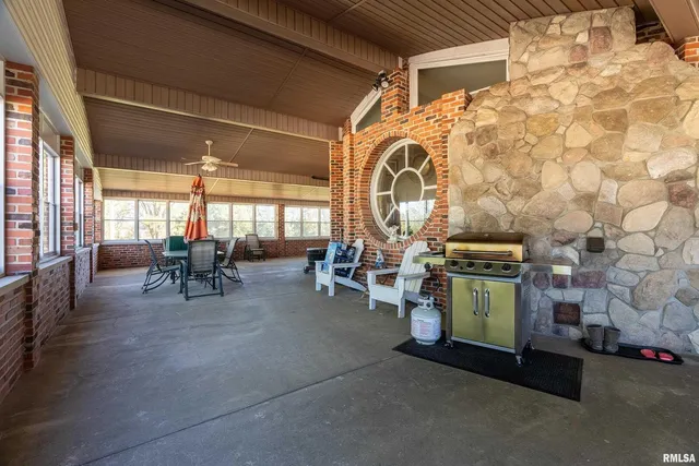 a lobby with furniture and window