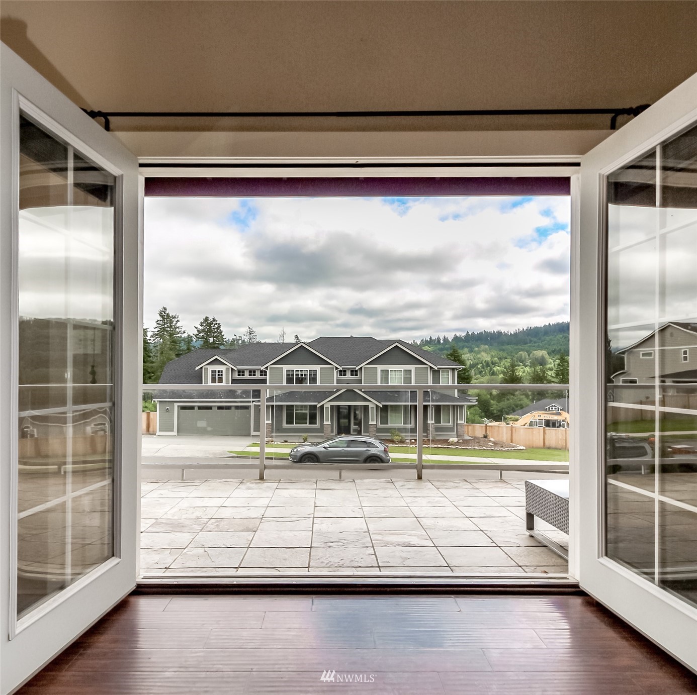 889 Lund Street Buckley, WA 98321 - Photo 21 of 40 a view of a glass door with a big yard from a balcony