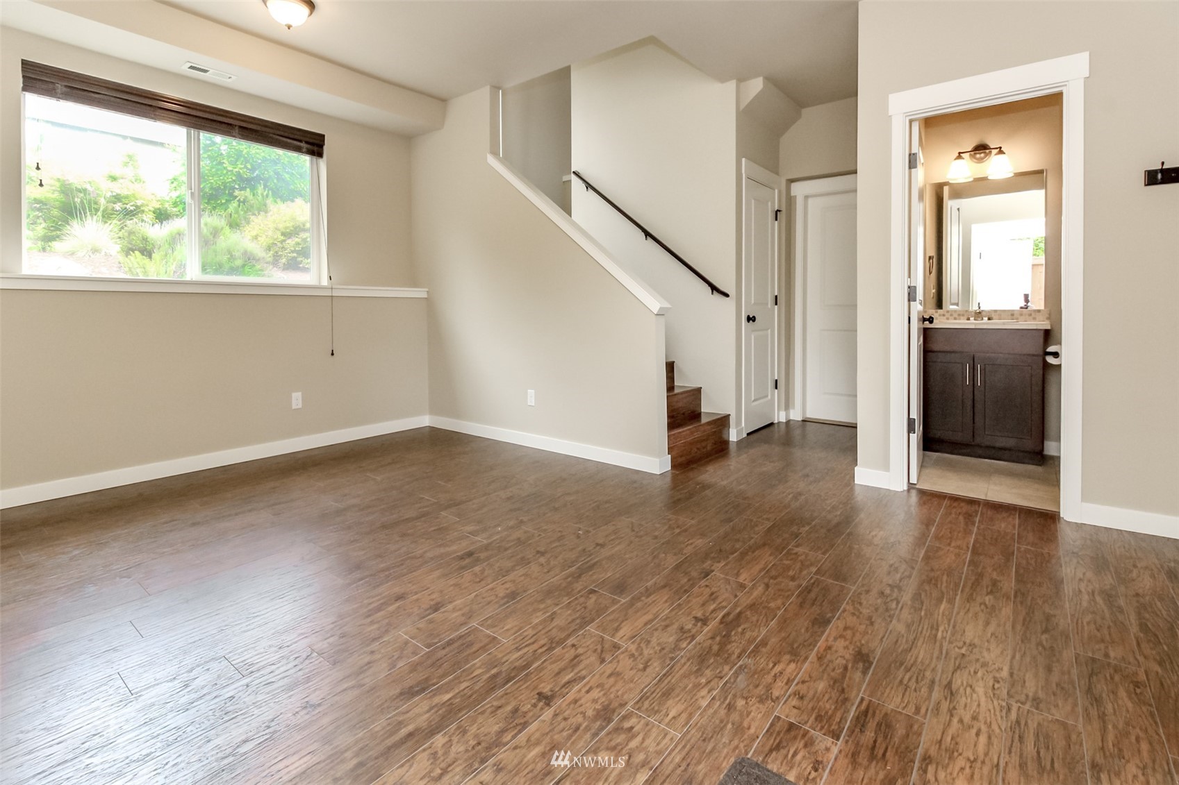 889 Lund Street Buckley, WA 98321 - Photo 30 of 40 wooden floor in an empty room with a window