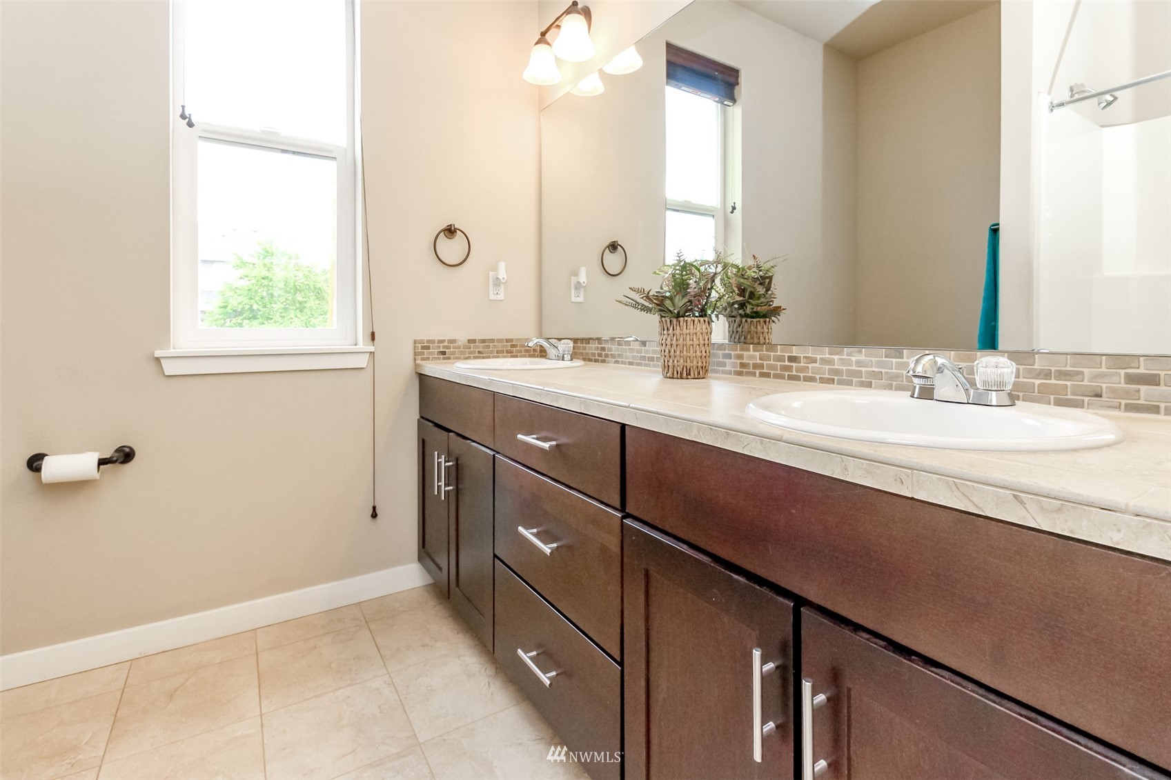 889 Lund Street Buckley, WA 98321 - Photo 34 of 40 a bathroom with a sink a vanity and a mirror