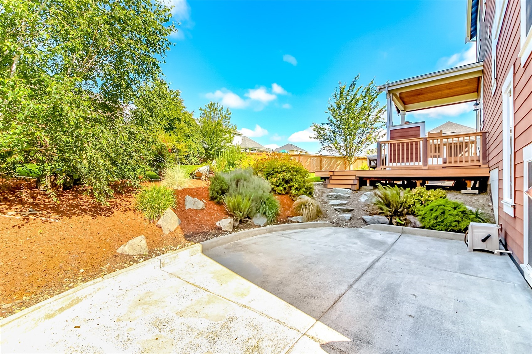 889 Lund Street Buckley, WA 98321 - Photo 38 of 40 a view of a garden with a building in the background