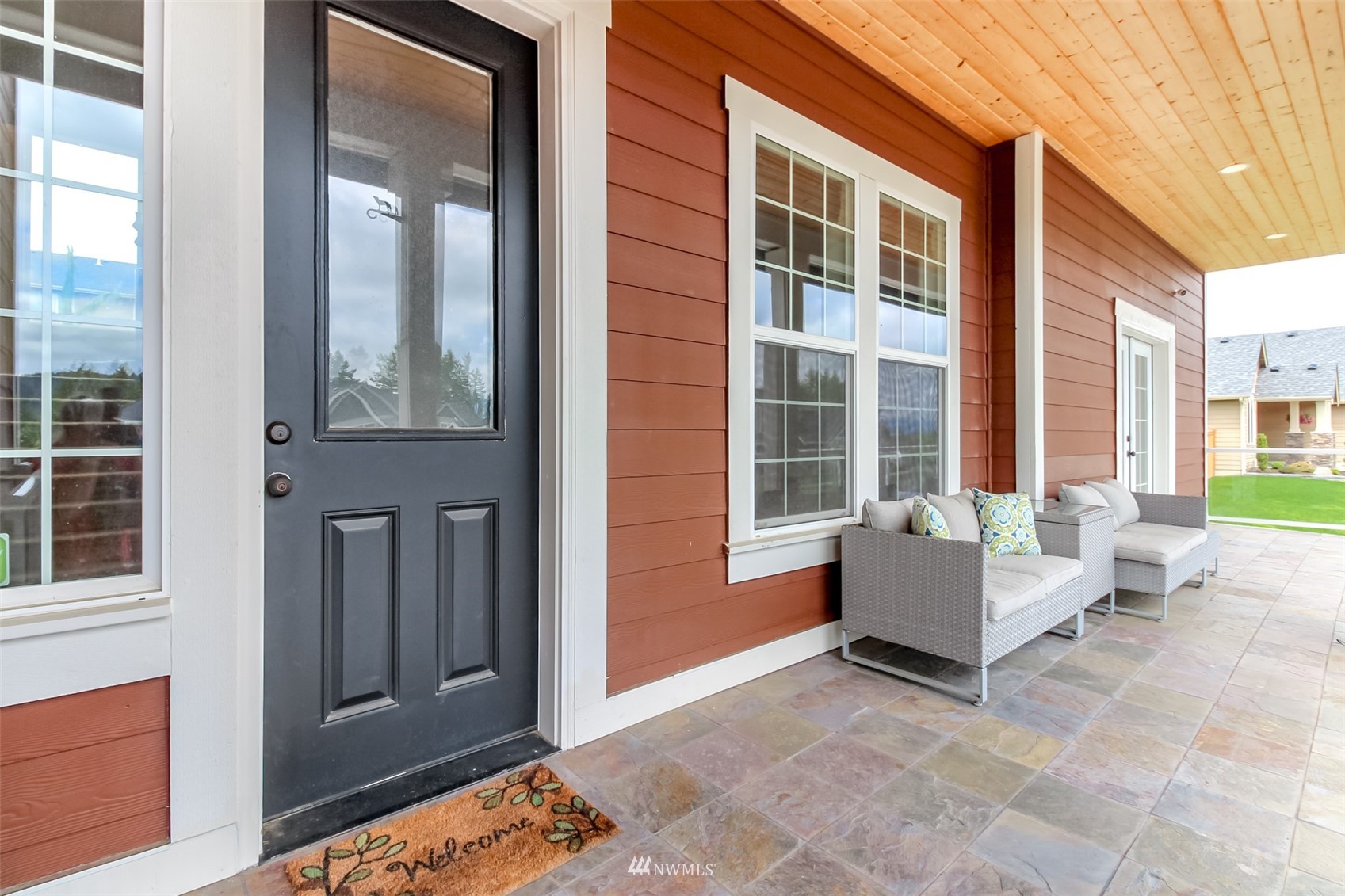 889 Lund Street Buckley, WA 98321 - Photo 4 of 40 a living room filled with furniture and windows
