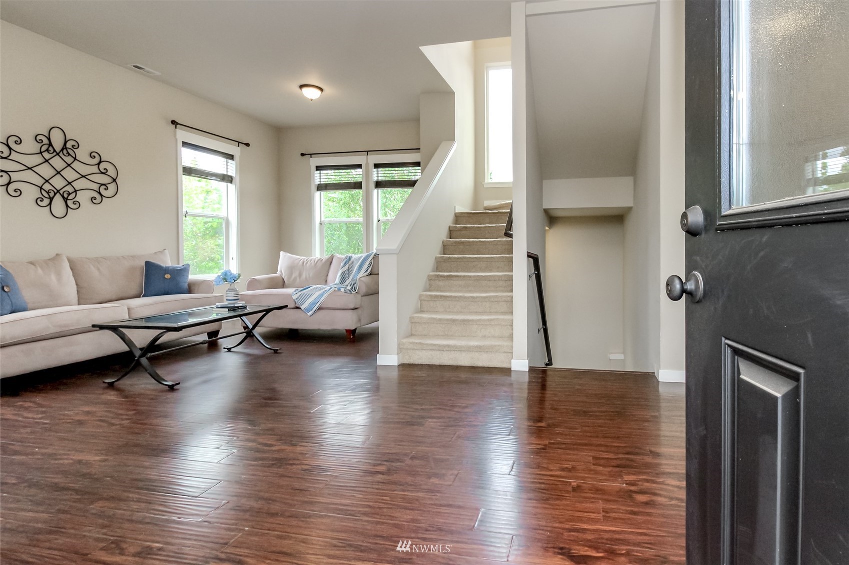 889 Lund Street Buckley, WA 98321 - Photo 5 of 40 a living room with furniture and a wooden floor