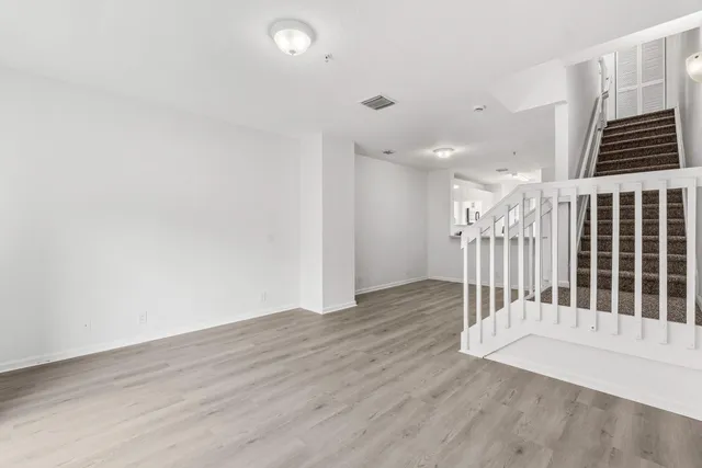 a view of entryway with wooden floor
