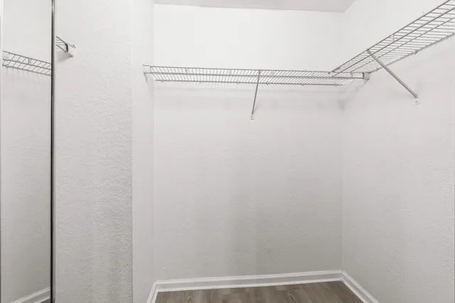 a view of a room with racks on the wall