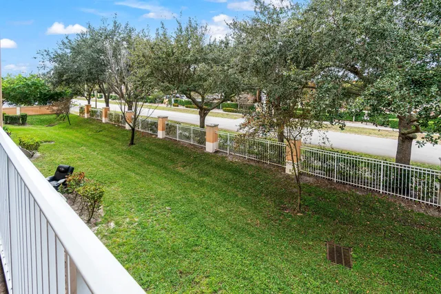 a view of house with yard