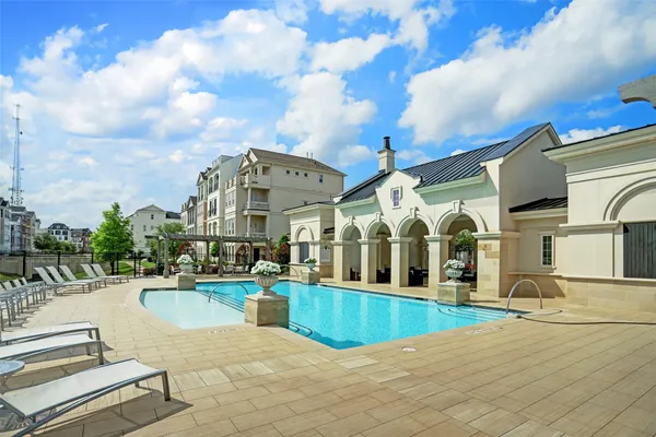 a view of a building with a swimming pool