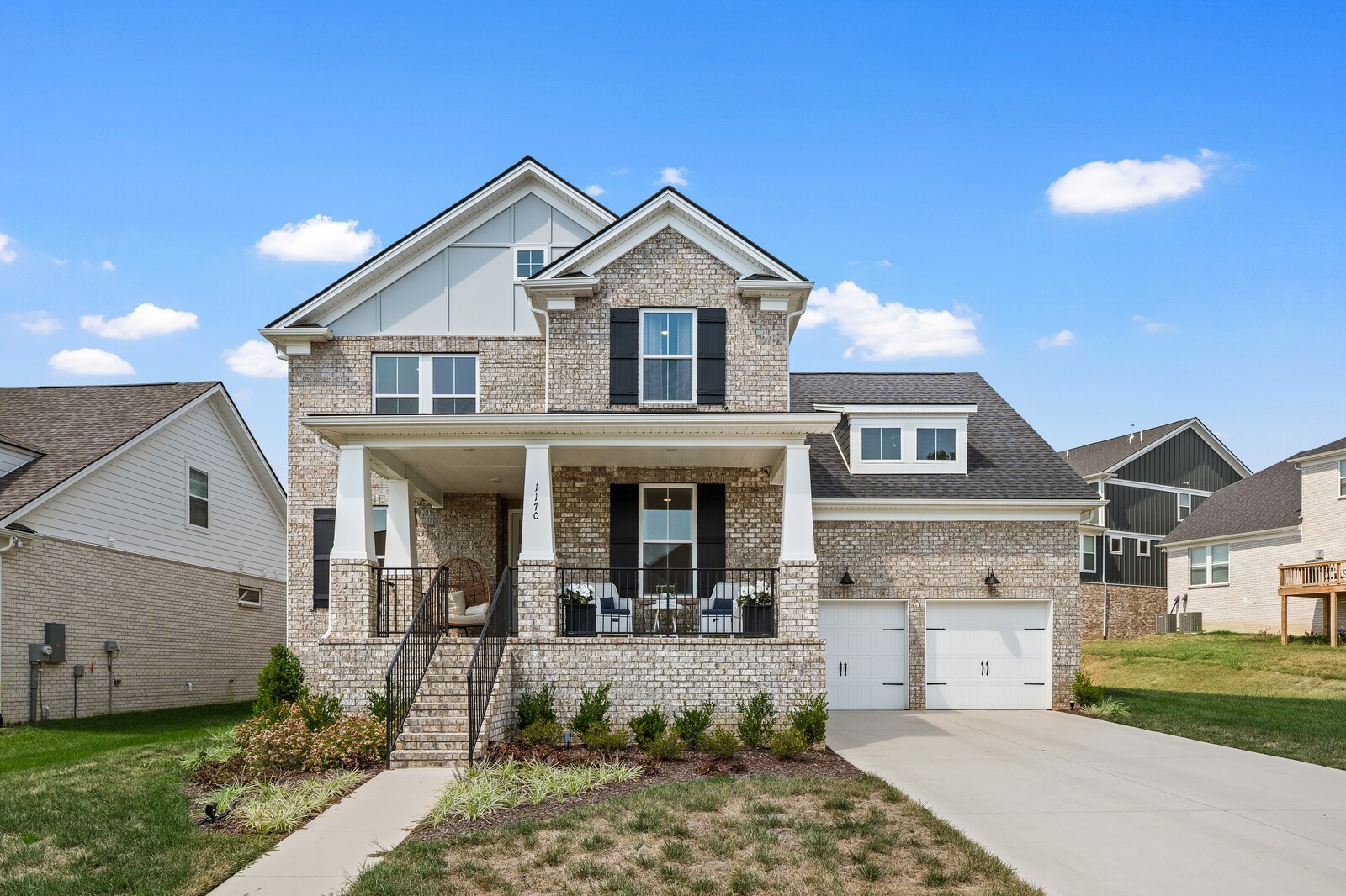 a view of a yard in front of a house