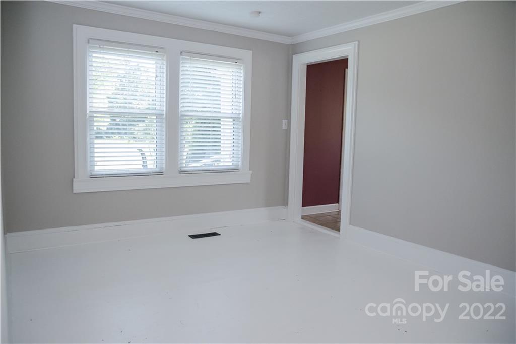 118 Baxter Street Morganton, NC 28655 - Photo 11 of 18 a view of an empty room with a window