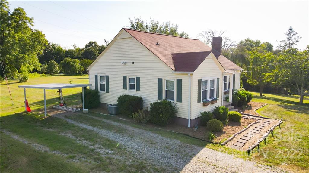 118 Baxter Street Morganton, NC 28655 - Photo 3 of 18 a view of a house with backyard and sitting area