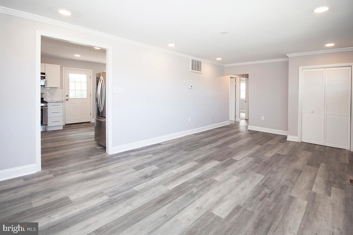 462 West Browning Road Bellmawr, NJ 08031 - Photo 16 of 33 Living Room With Crown Molding