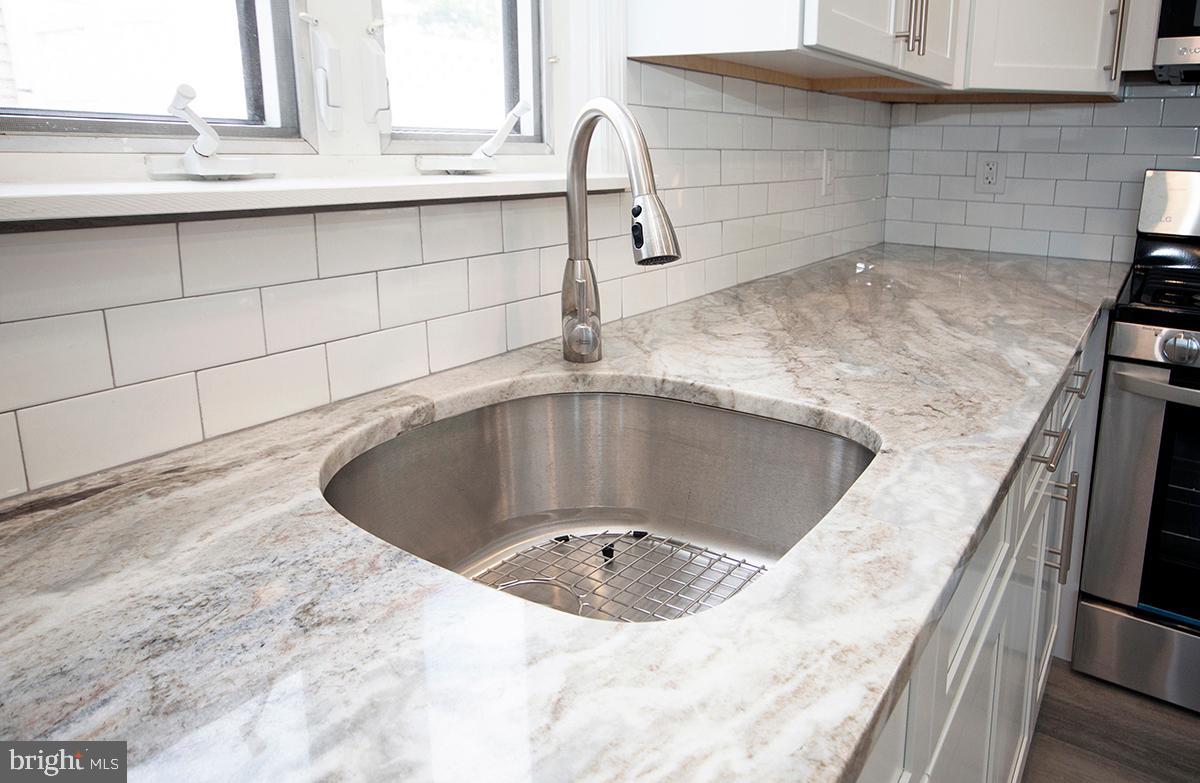 462 West Browning Road Bellmawr, NJ 08031 - Photo 8 of 33 Close Up Of Undermount Stainless Steel Sink