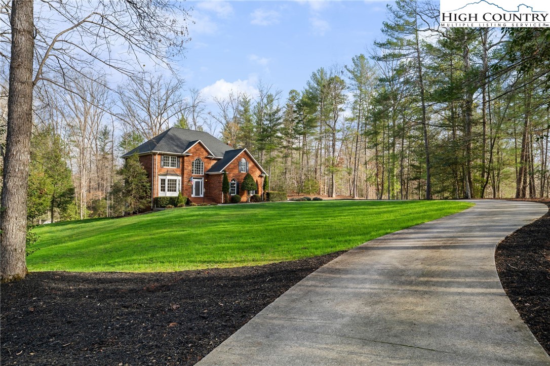 458 Jim Caudill Road Wilkesboro, NC 28697 - Photo 3 of 50 a front view of a house with a yard