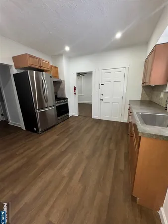 a view of kitchen and a sink