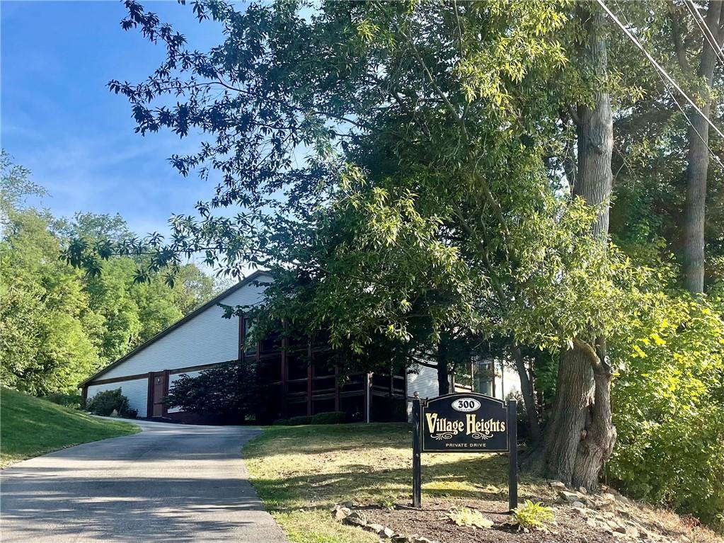 300 6th Street, Unit 10 Beaver, PA 15009 - Photo 1 of 18 a view of a fountain in front of house