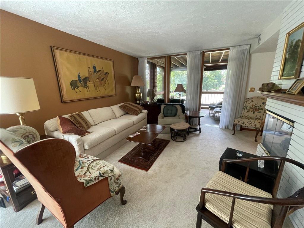 300 6th Street, Unit 10 Beaver, PA 15009 - Photo 5 of 18 a living room with furniture and a flat screen tv